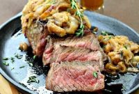 Strip Steak with Caramelized Onion Sauce and Fresh Herbs