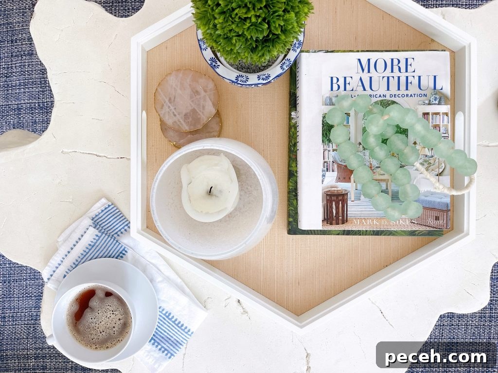 coffee mug and interior books on a table