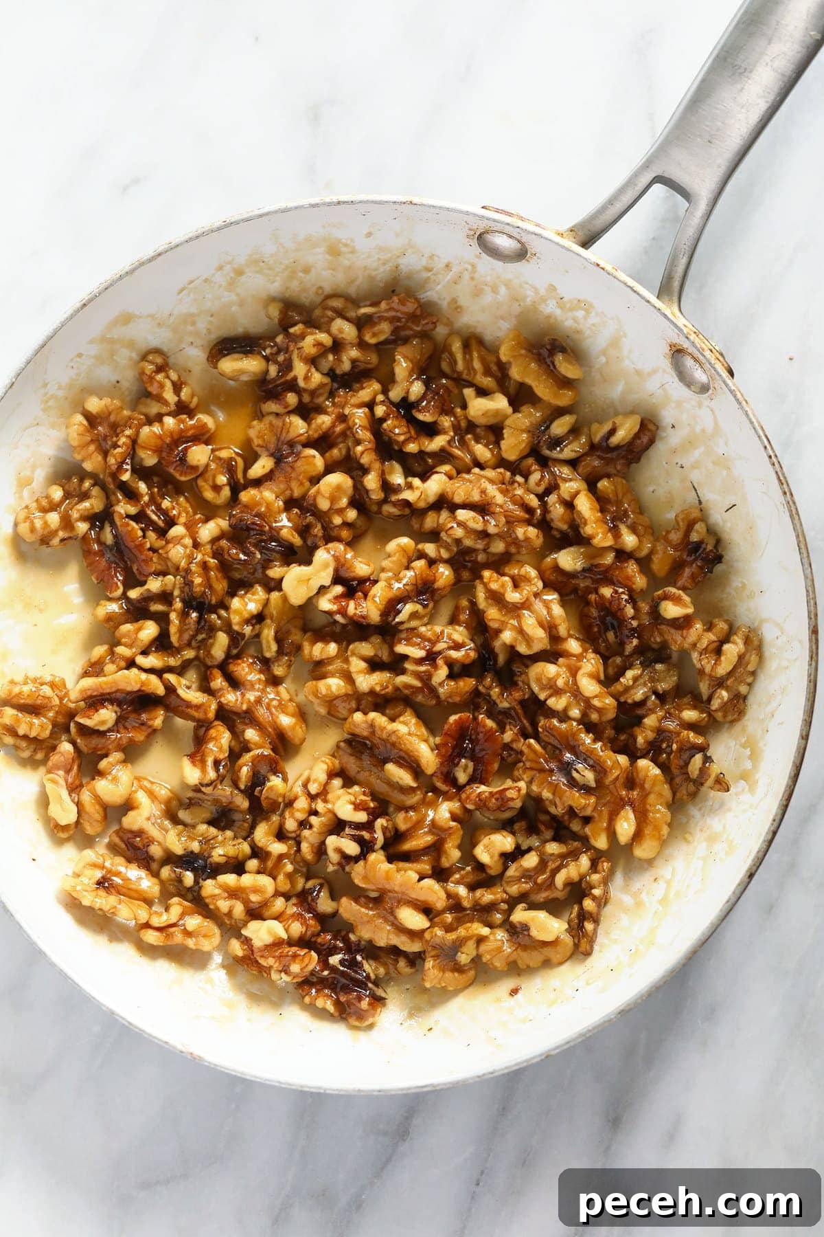 Candied Walnuts Recipe: Crunchy Sweet Coated Nuts in 20 Minutes 4 Candied walnuts in a pan