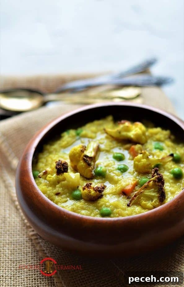 Daliya Khichdi recipe garnished with ghee