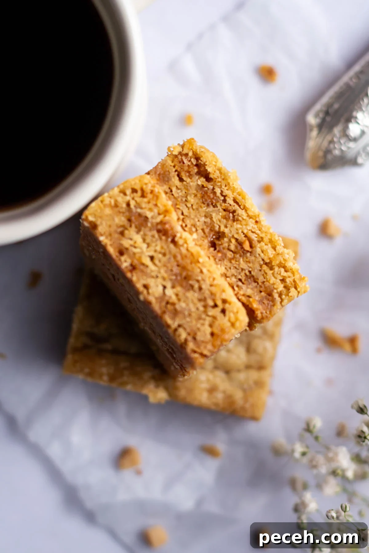 Chewy Browned-Butter Blondies with Crisp Edges 15 toffee bits showing on the inside of browned butter Blondie bars