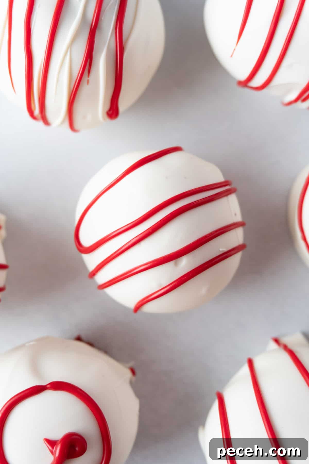 red velvet cake balls white with red stripes.