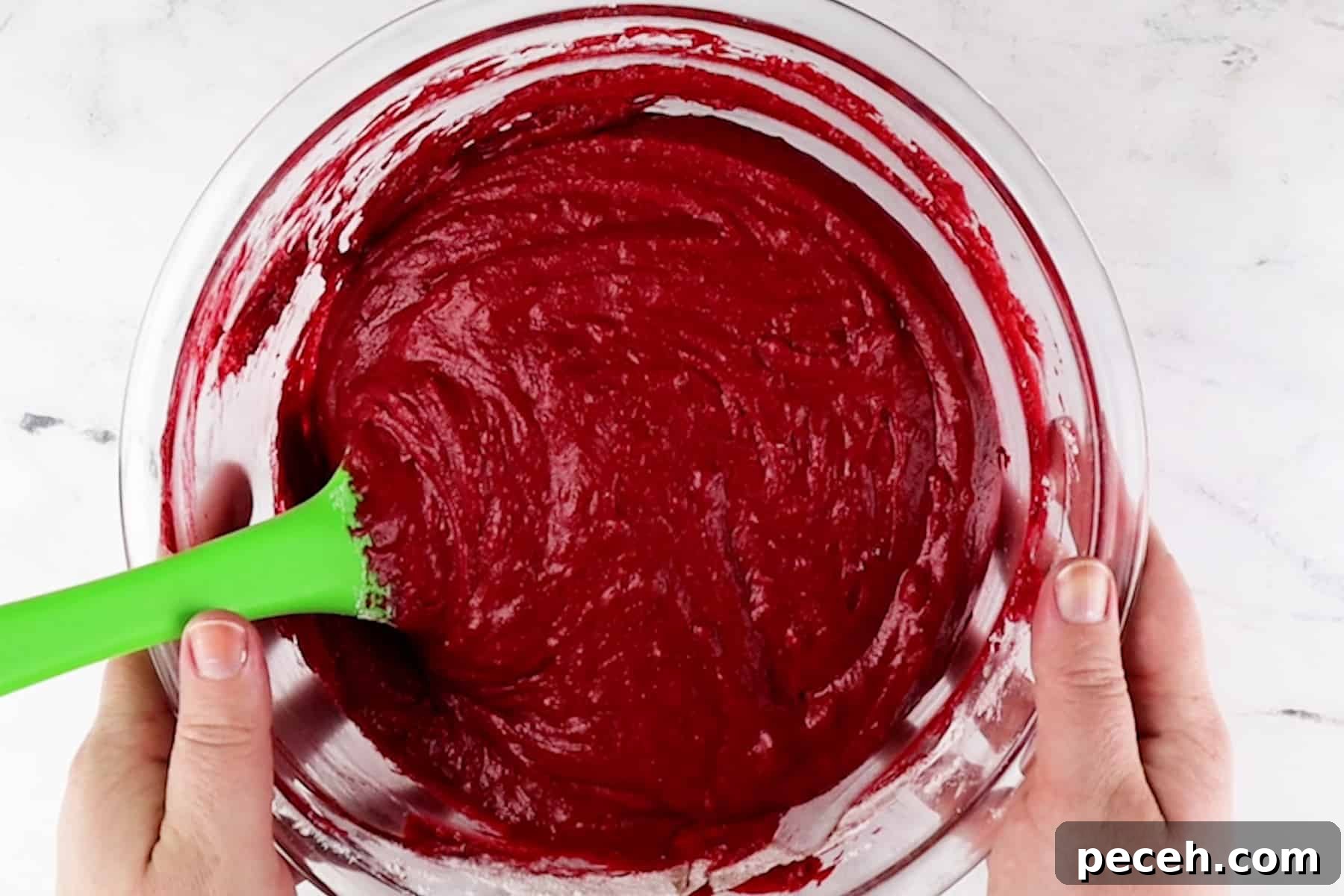 red velvet cake batter in glass bowl.