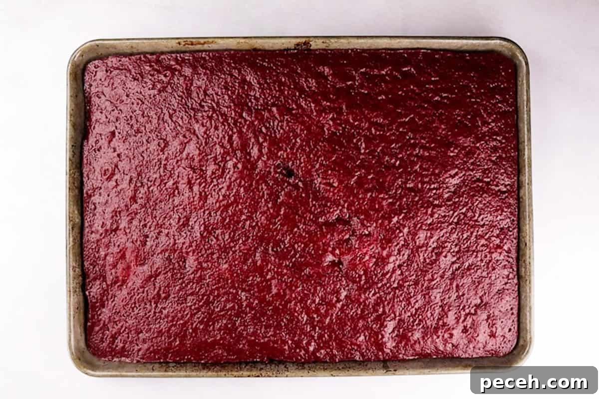 baked red velvet cake in cake pan.