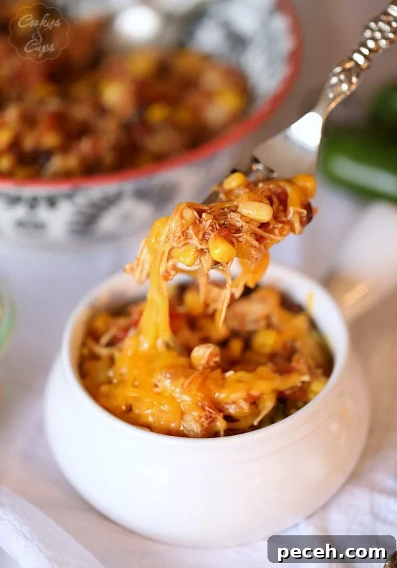 Slow Cooker Mexican Fiesta Chicken Recipe for Tender Shredded Meat 10 Slow Cooker Fiesta Chicken. Easy, low fat and can be used for so many dinners! | www.cookiesandcups.com