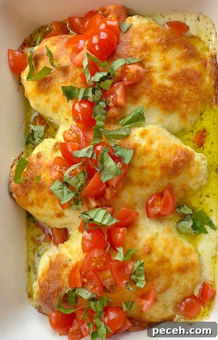 Creamy Pesto Baked Chicken Recipe with Garlic Parmesan Crust 7 How to make chicken breasts topped with a mixture of cream cheese and basil pesto followed by lots of shredded mozzarella.