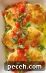 Creamy Pesto Baked Chicken Recipe with Garlic Parmesan Crust 8 How to make chicken breasts topped with a mixture of cream cheese and basil pesto followed by lots of shredded mozzarella.
