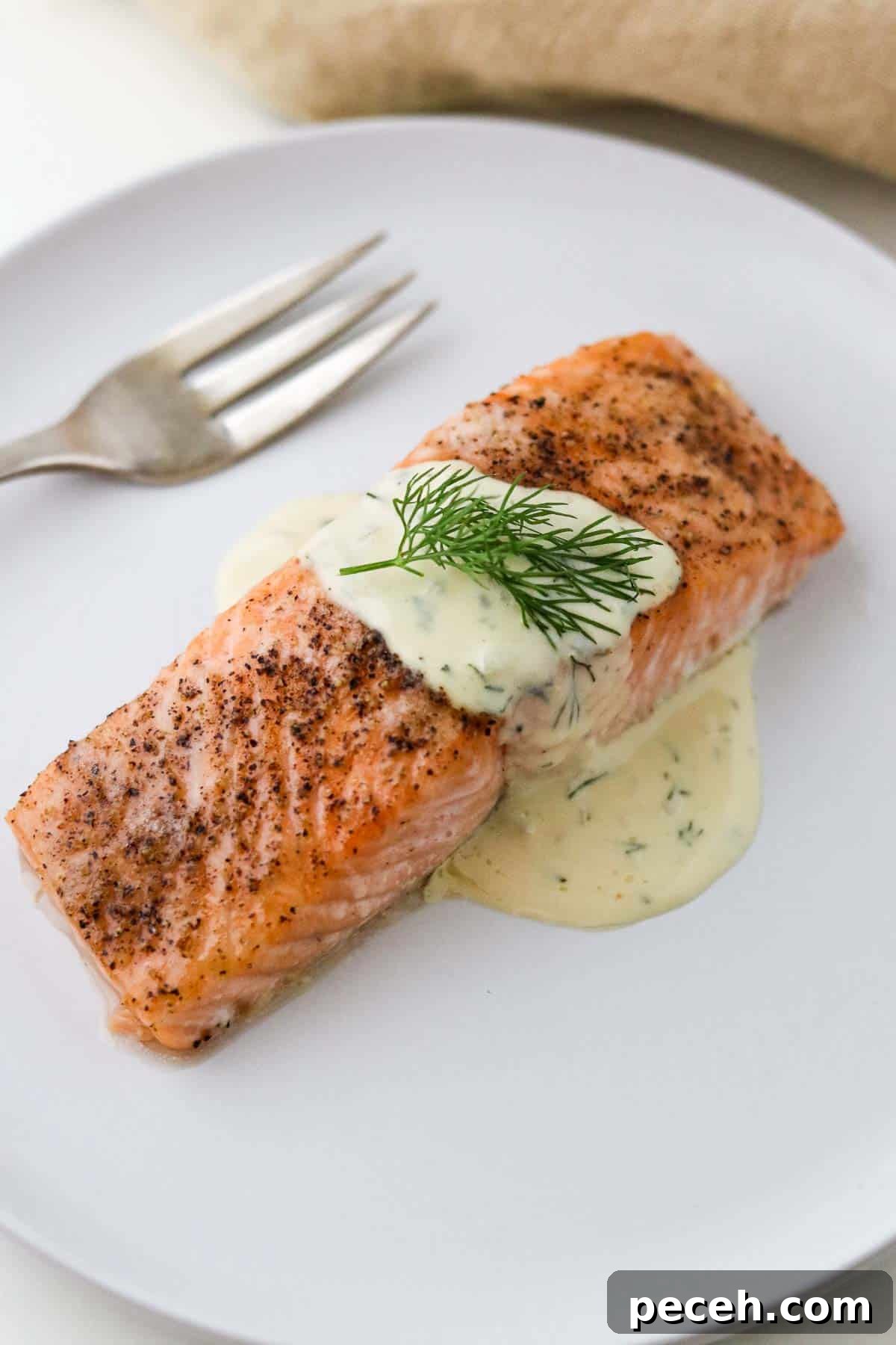 Brown Sugar Butter Baked Salmon with Garlic and Lemon 6 Baked Salmon with Butter and Brown Sugar topped with Warm Mustard Dill Sauce.