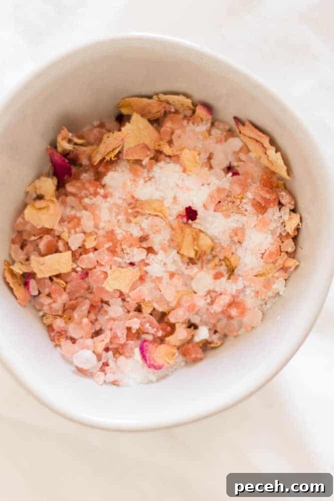 Himalayan Pink Salt Uses: 12 Practical Ways to Use It at Home 3 Pink salt and rose petal salt bath soak in small bowl .