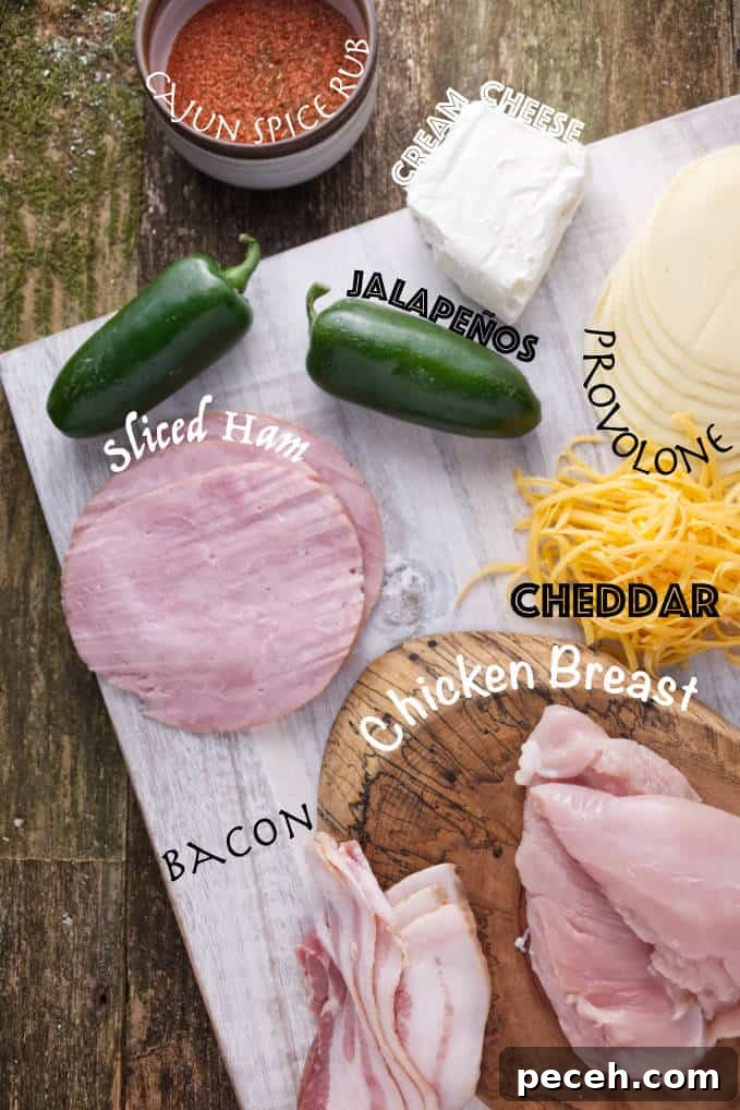 Smoked Jalapeño Popper Stuffed Chicken Recipe 3 Ingredients for smoked jalapeño popper chicken: cajun spice rub, cream cheese, jalapeños, sliced ham, provolone cheese, cheddar cheese, bacon, and chicken breast.