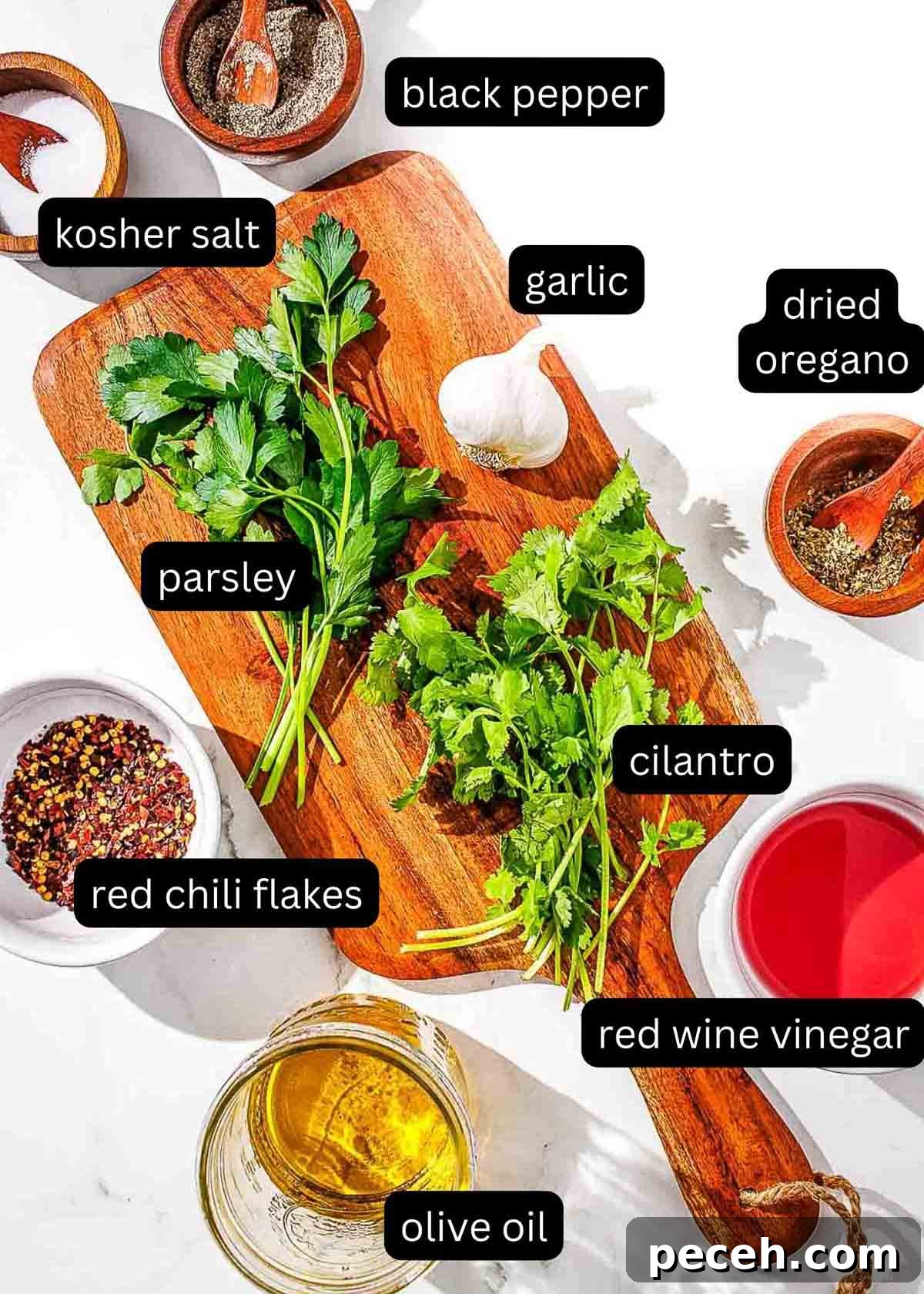 Cilantro Chimichurri Sauce: Zesty Recipe for Grilled Meats and Veggies 4 A cutting board with labeled ingredients for cilantro chimichurri.