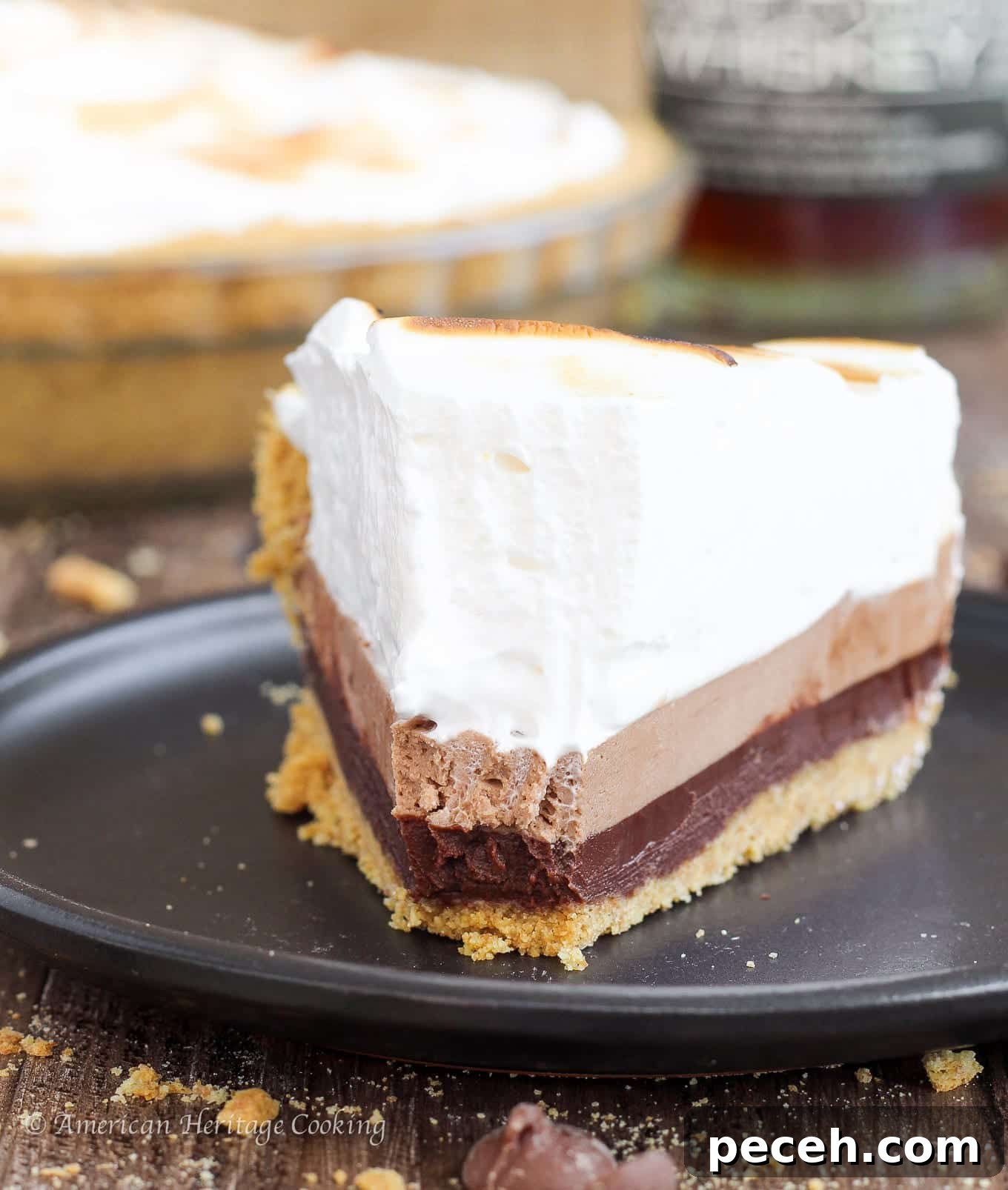 No-Bake Whiskey S'mores Pie Recipe for Rich, Boozy Dessert 6 No bake Whiskey Smores Pie with graham crust, ganache, mousse and marshmallow fluff