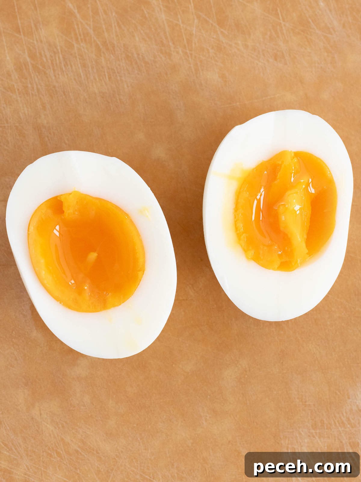 Fluffy Tamago Sando: Authentic Japanese Egg Sandwich Recipe 6 Soft boiled egg cut in half.