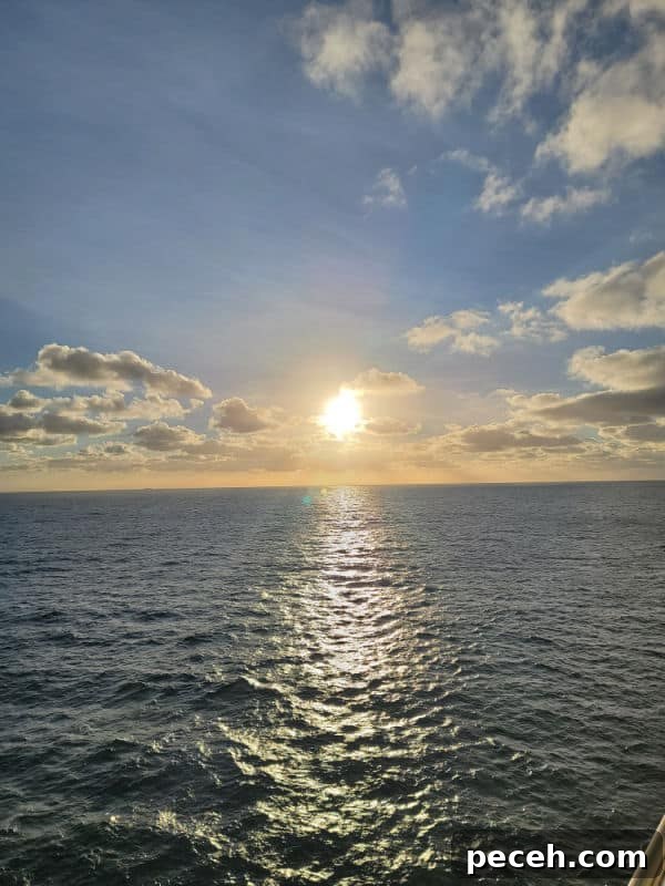 3-Night Royal Caribbean Navigator of the Seas Cruise to Ensenada 13 Sunset over the ocean with fluffy white clouds