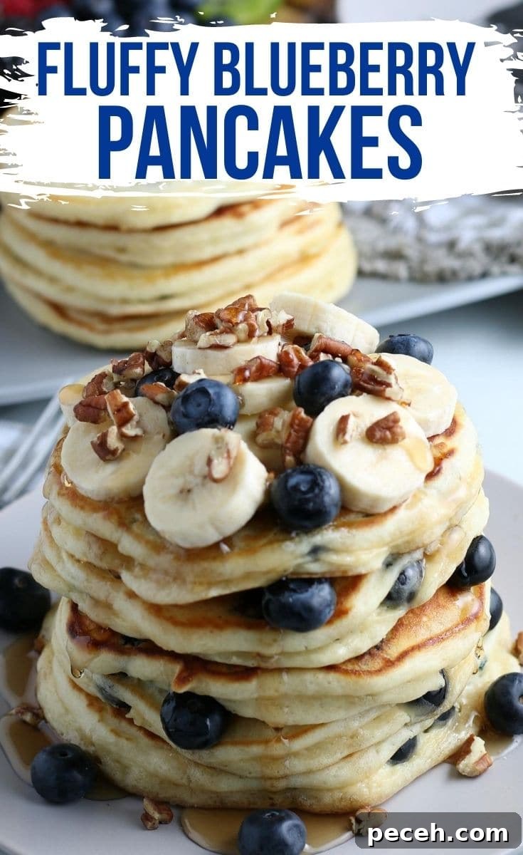 Homemade Blueberry Pancake Recipe for Fluffy, Perfect Stacks 2 A stack of blueberry pancakes topped with bananas, blueberries, and walnuts