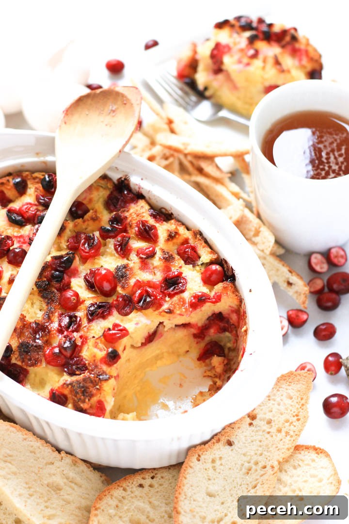 Cranberry Bread Pudding (Gluten-Free, Dairy-Free) Dessert in a white casserole dish.