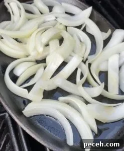Dwaeji Galbi Pork Ribs Recipe: Ham Ji Park Copycat Version 8 Skillet with ribs and onions