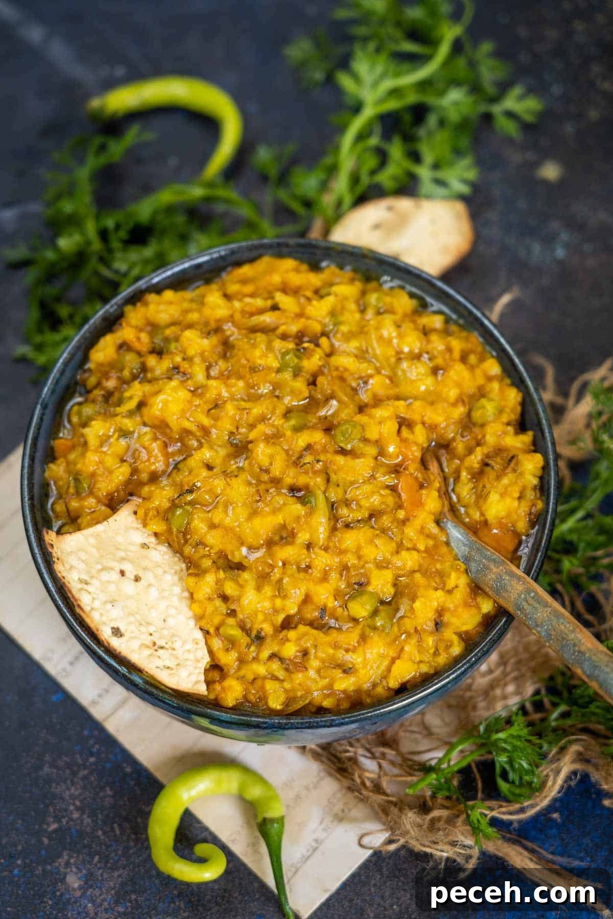 Spiced Khichdi Recipe: Comforting One-Pot Indian Meal 2 Masala khichdi served in a bowl.