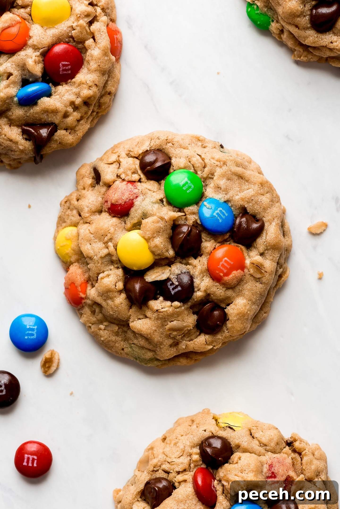 Soft Chewy Monster Cookies Recipe – Loaded Chocolate Chip Cookies 9 A peanut butter oatmeal cookie studded with M&M's and chocolate chips.