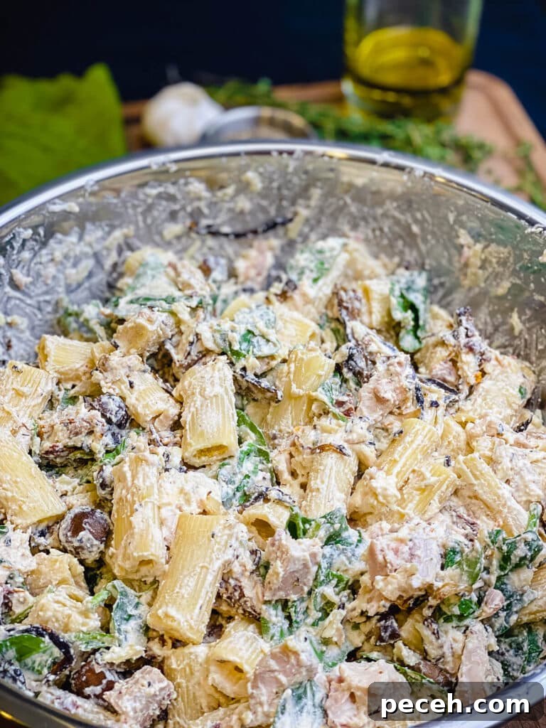 Creamy Chicken and Mushroom Rigatoni Recipe for Weeknights 11 pasta bake ingredients in a large mixing bowl