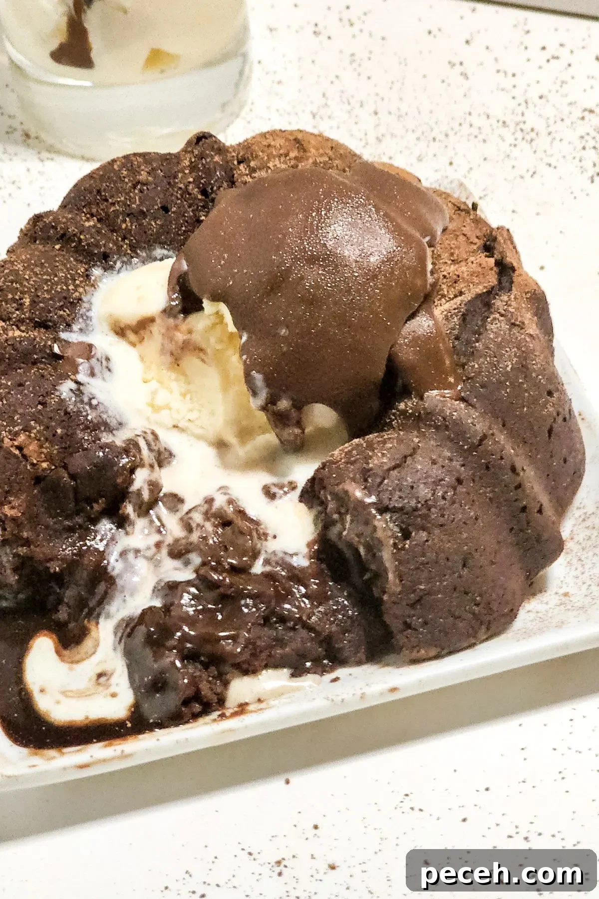 A dairy free chocolate molten lava cake on a plate. 