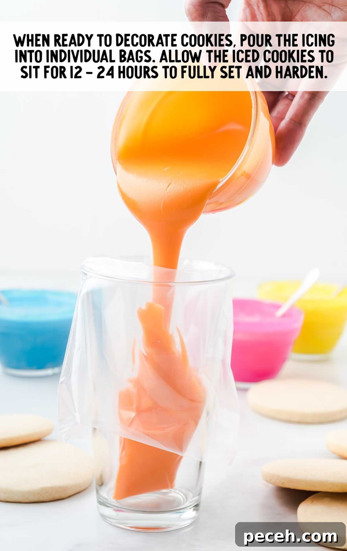 Simple Sugar Cookie Icing Recipe for Perfect Decorating 6 glass with a piping bag being filled with orange icing