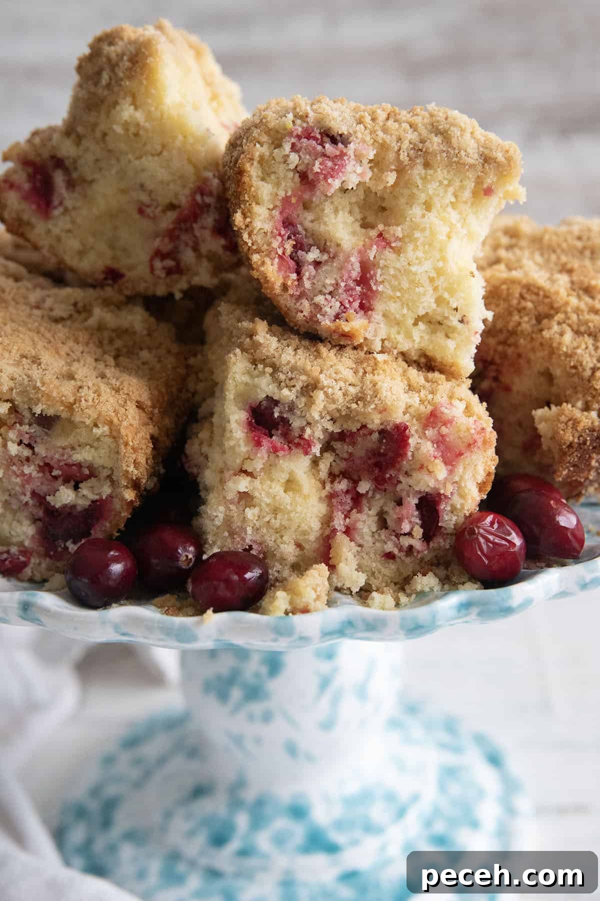 cranberry coffee cake on a cake plate