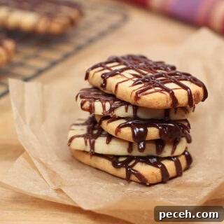 Stack of Heath Bread Shortbread Cookies with Chocolate Drizzle