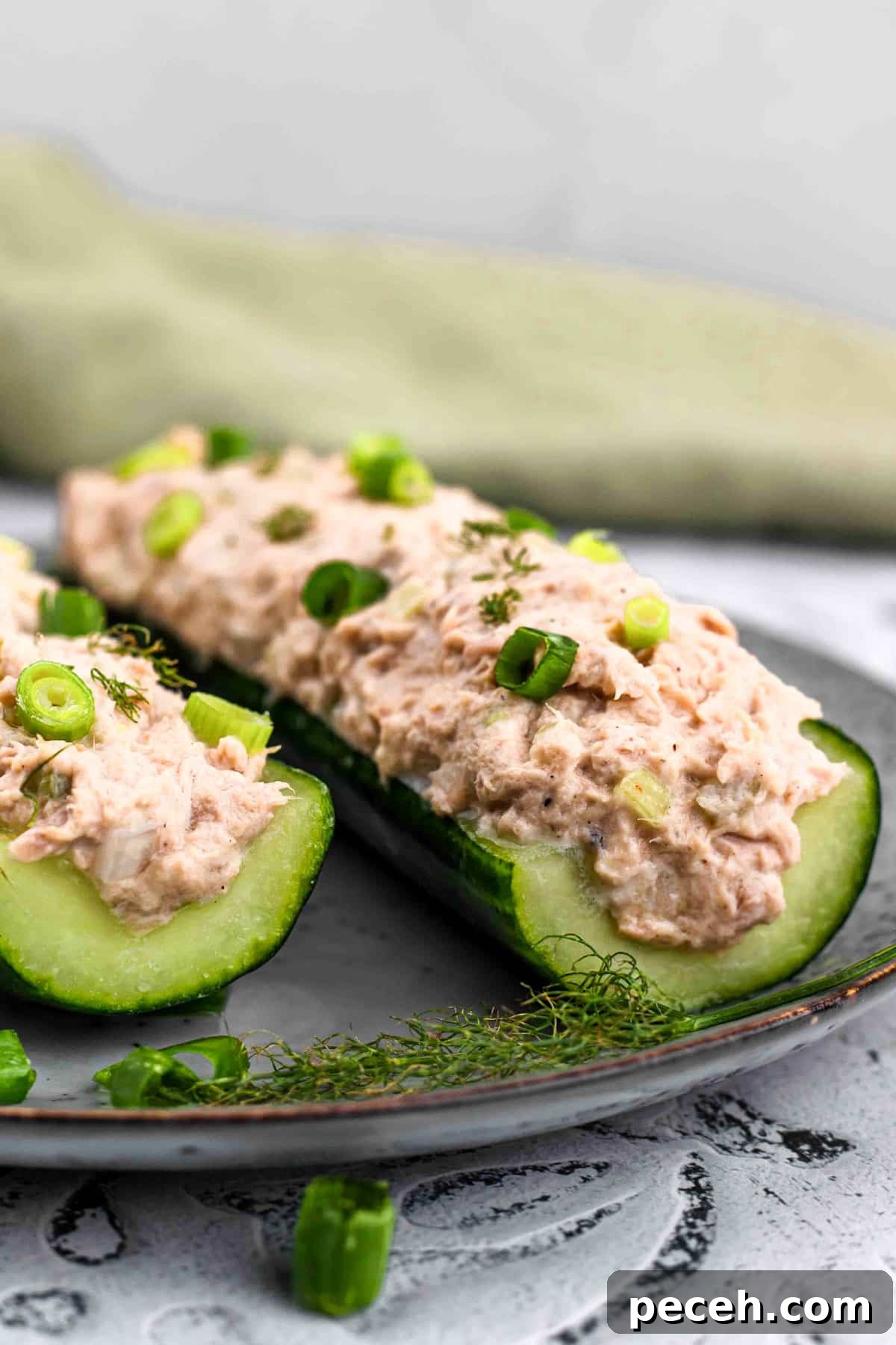 21 High-Protein, Low-Carb Summer Snacks for Hot Days 7 tuna cucumber boats