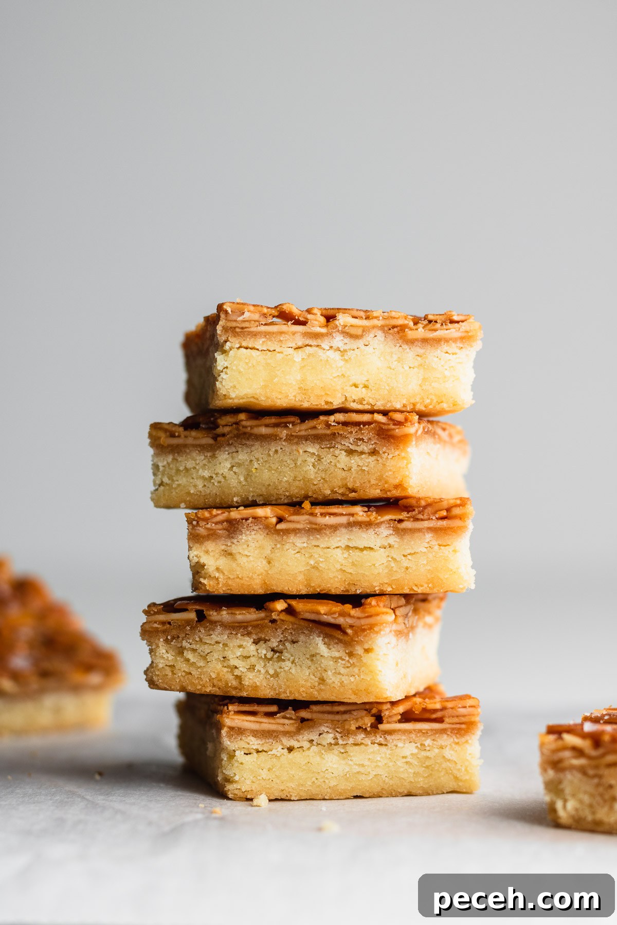 Crispy Florentine Sablé Cookies with Almond Honey Glaze 4 almond Florentine with shortbread cookies stacked