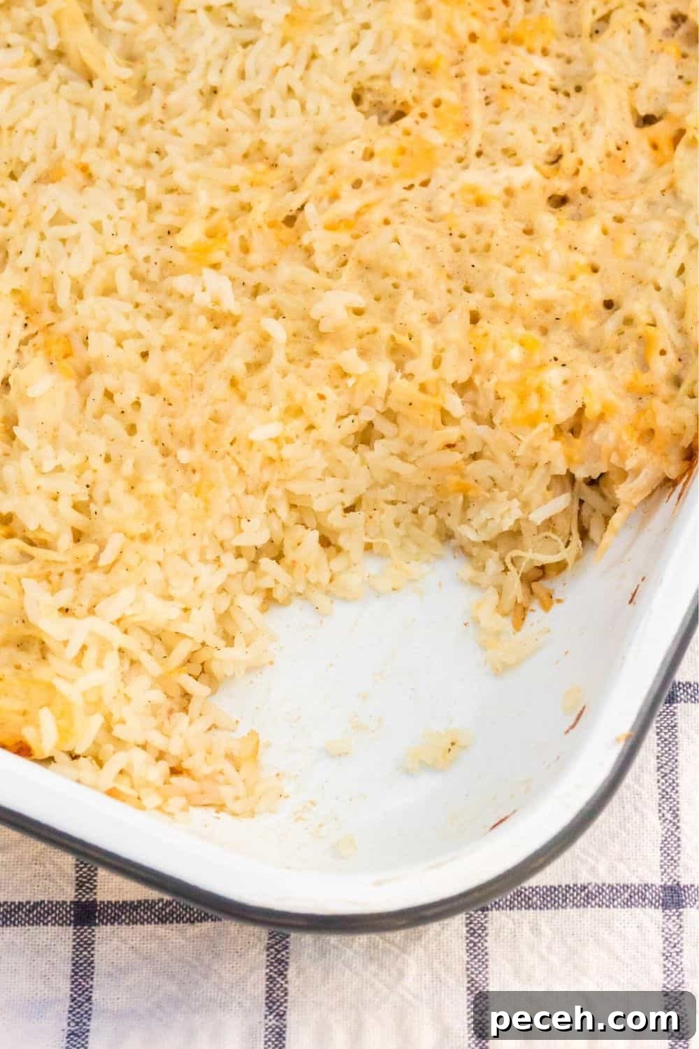 No-Peek Chicken and Rice Casserole: Tender, Foolproof Meal 5 chicken and rice in a baking dish, with some of it scooped out