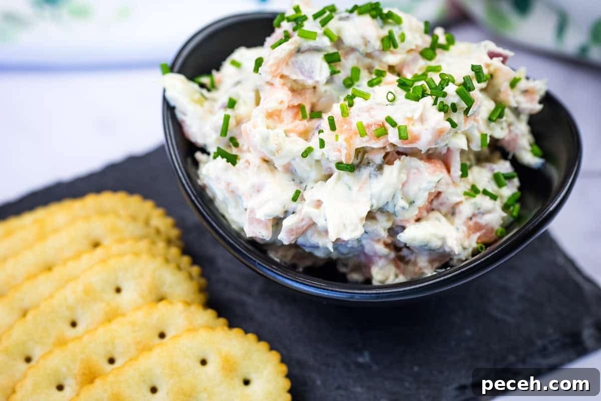 17 Mother’s Day Brunches You Can Enjoy Without Reservations or Parking Hassles 13 Bowl of smoked salmon spread garnished with chopped chives next to crackers on a slate platter.