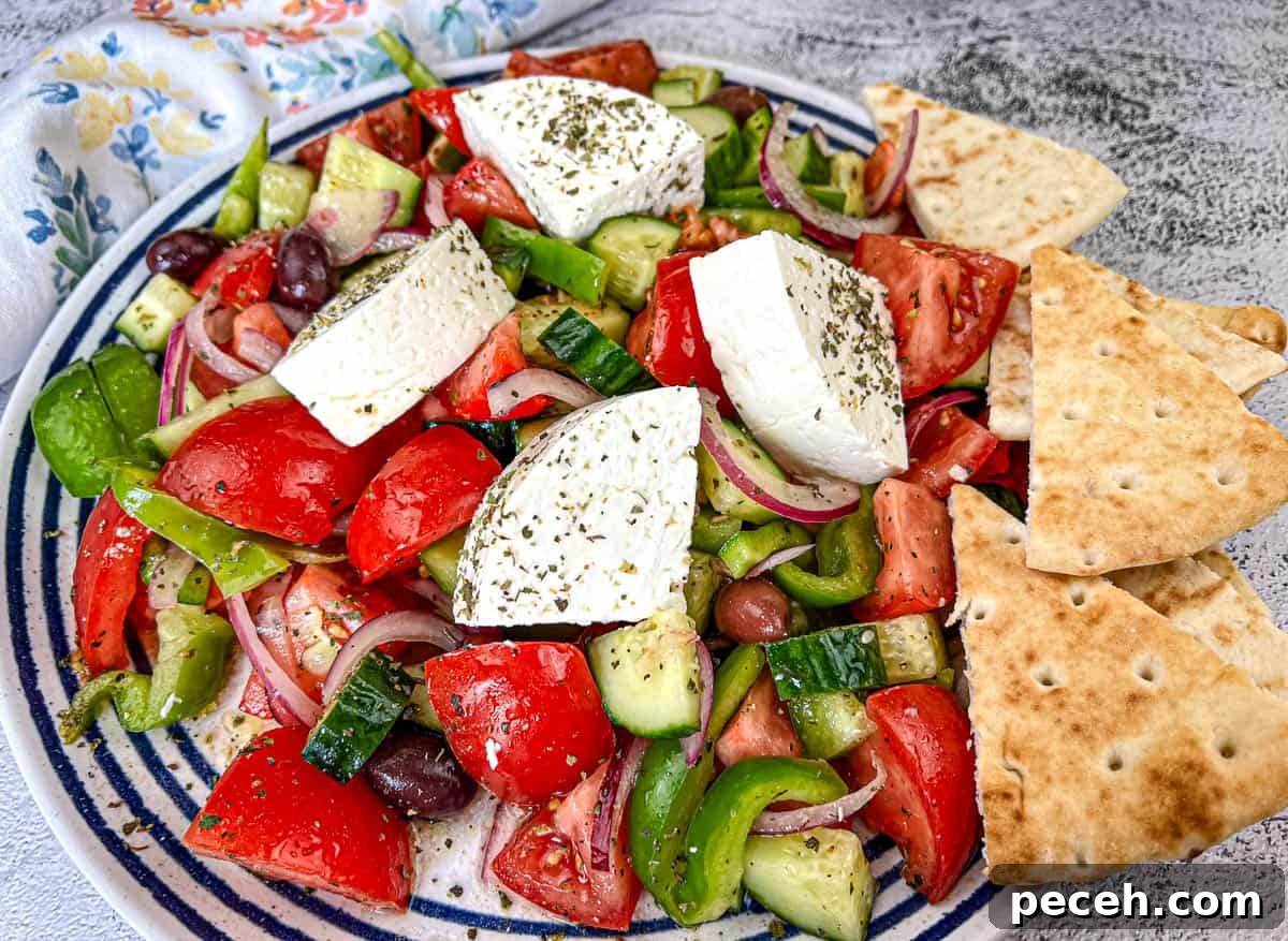 17 Mother’s Day Brunches You Can Enjoy Without Reservations or Parking Hassles 9 Horiatiki Salad with feta cheese on top served on a plate.