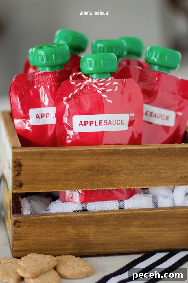 Apple of My Eye: Homemade Applesauce Valentine Recipe 3 How cute are these applesauce squeeze pouches in an apple crate?! Gluten free, nut free, dairy free, and ORGANIC Valentine idea. Free printable. Emoji with apple eyes. #ValentinesDay #DIYValentine #glutenfree #nutfree #dairyfree #organic