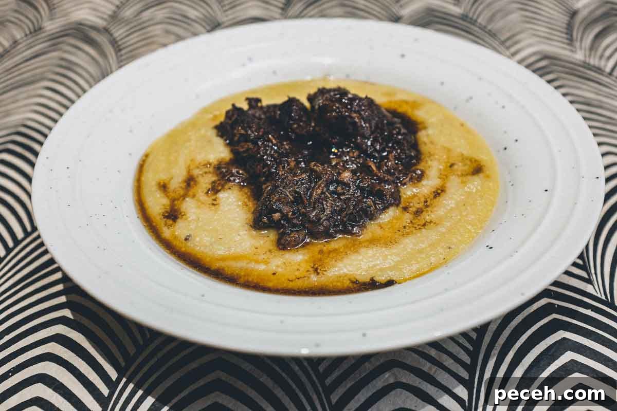 Peposo Alla Fornacina (Tuscan Beef Stew) | cookeatworld.com A bowl of Creamy Polenta with Peposo Alla Fornacina (Tuscan Beef Stew)