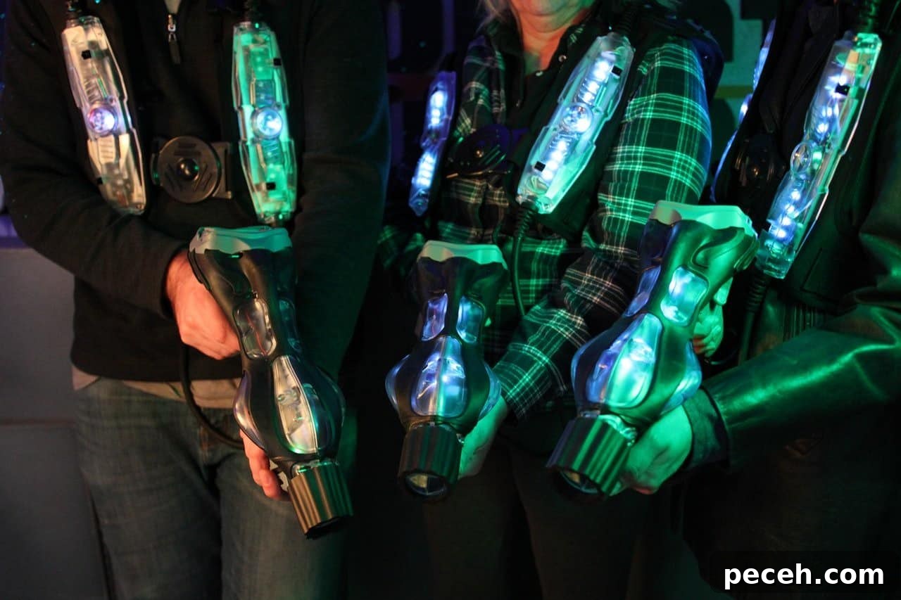 17 Fun and Memorable 13th Birthday Party Ideas 16 Players wearing laser tag equipment.