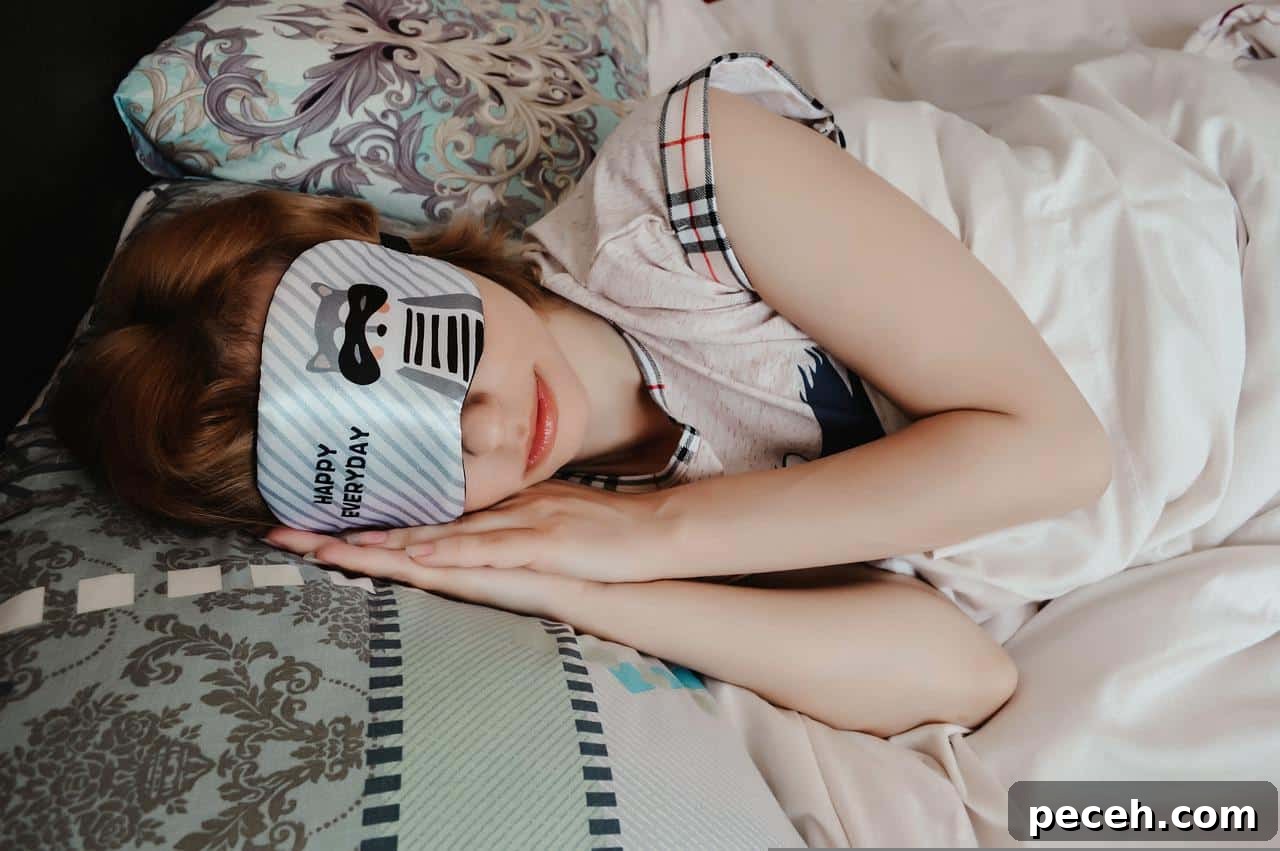 17 Fun and Memorable 13th Birthday Party Ideas 10 Young girl lying down on bed with sleeping mask.
