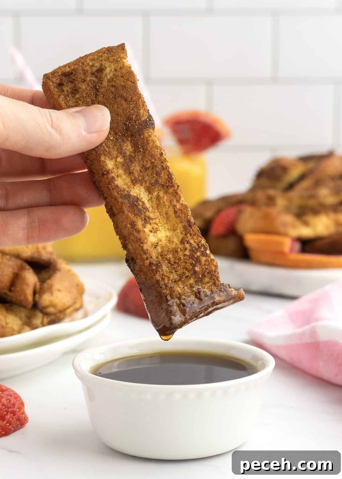 Crispy French Toast Sticks Recipe for Perfect Breakfast Bites 2 French Toast Sticks by The BakerMama