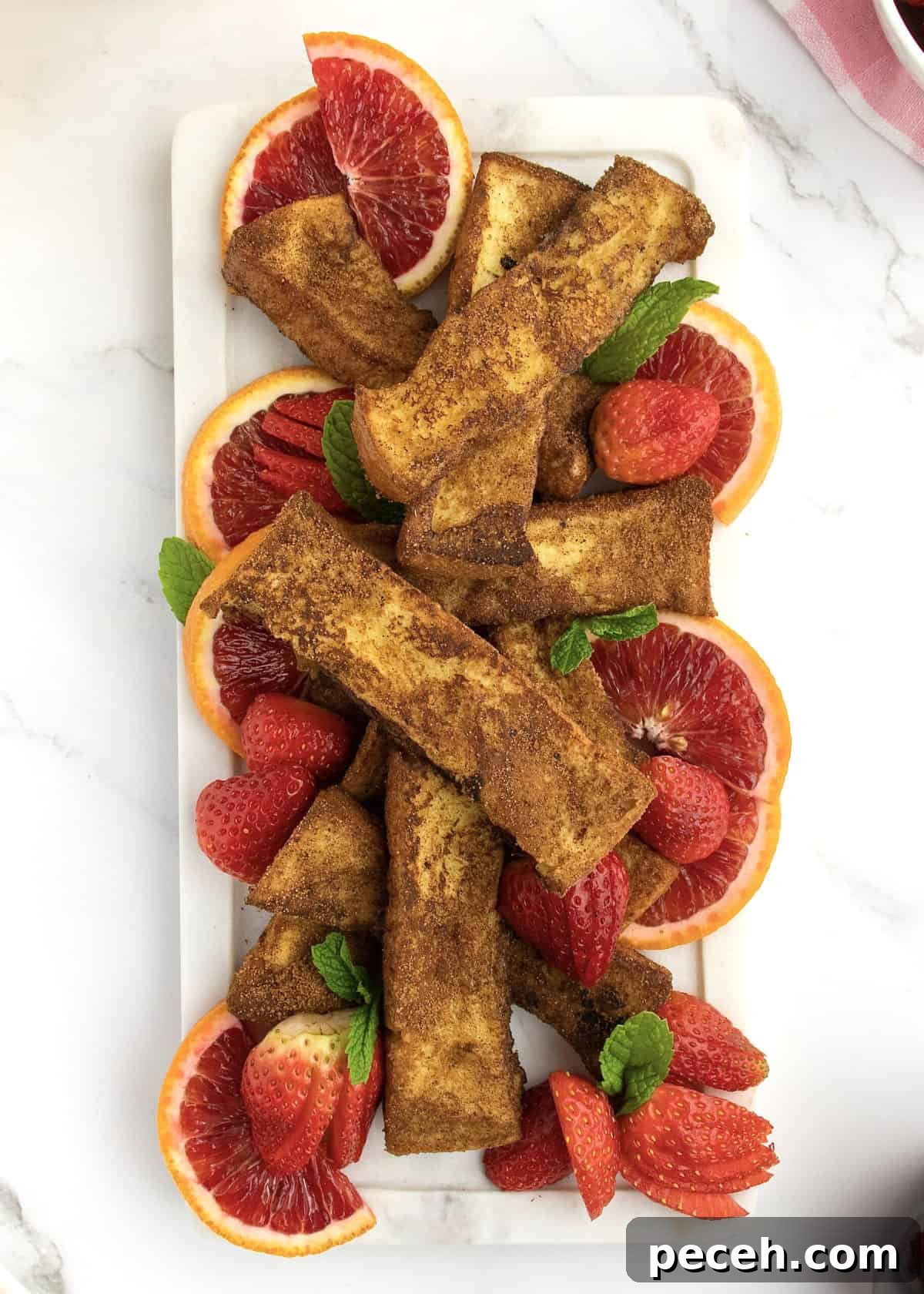 Crispy French Toast Sticks Recipe for Perfect Breakfast Bites 3 French Toast Sticks by The BakerMama