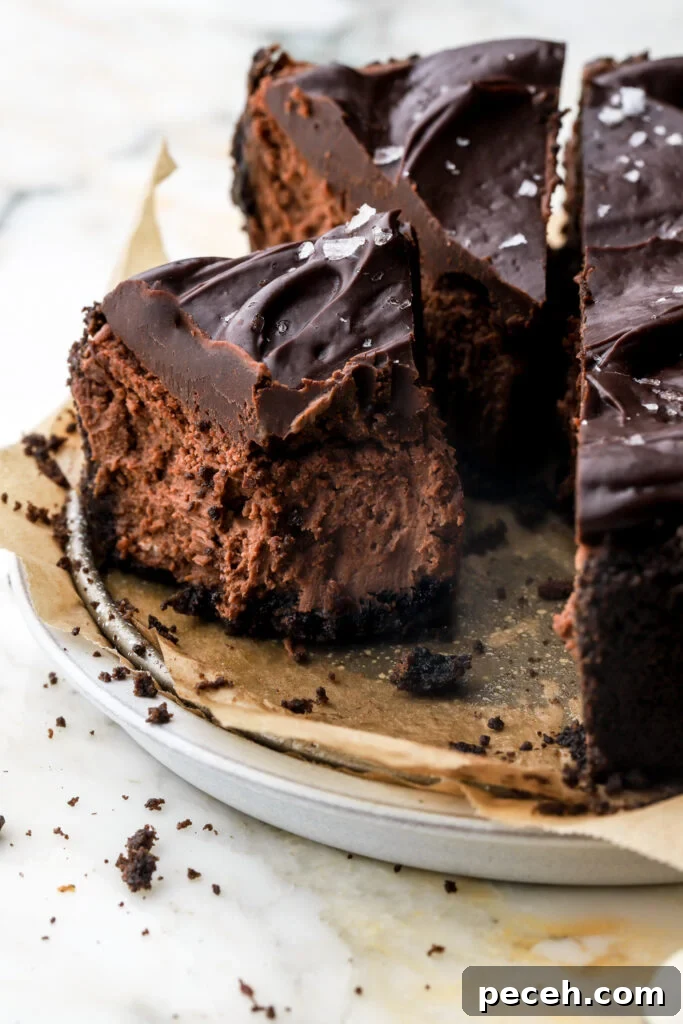 slice of chocolate cheesecake with a bite taken out
