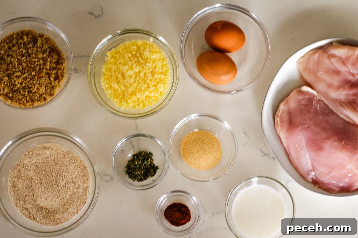 individual ingredients in bowls for chicken cutlet recipe.