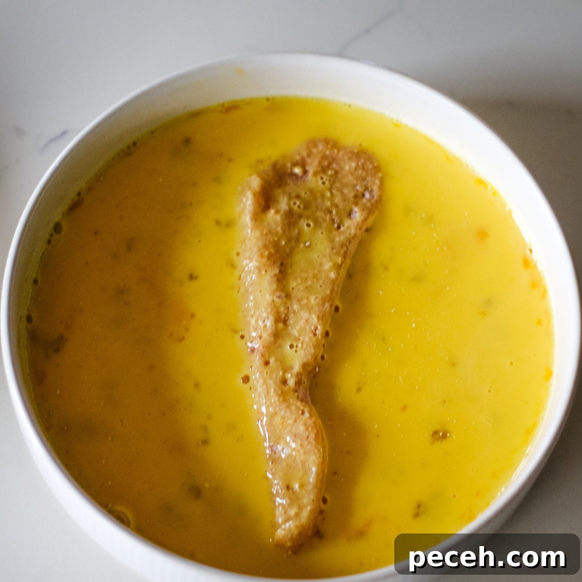 chicken cutlets dipped in egg.