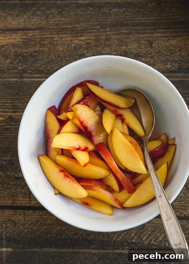 No-Bake Goat Cheese Cheesecake with Nectarine Compote 8 A bowl of sliced nectarines.
