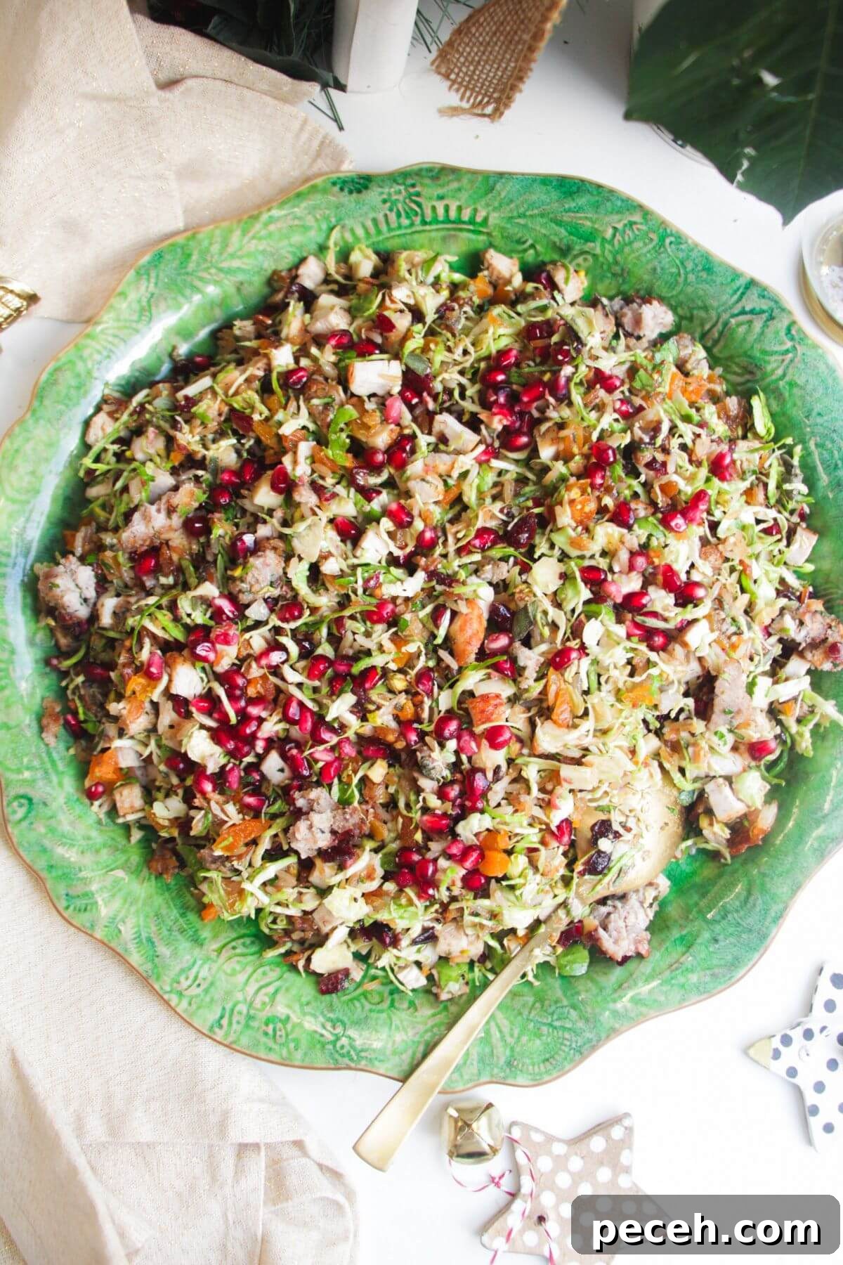 Cranberry-Dressed Crispy Rice Salad for Holiday Gatherings 2 Festive crispy rice salad on a large green platter.