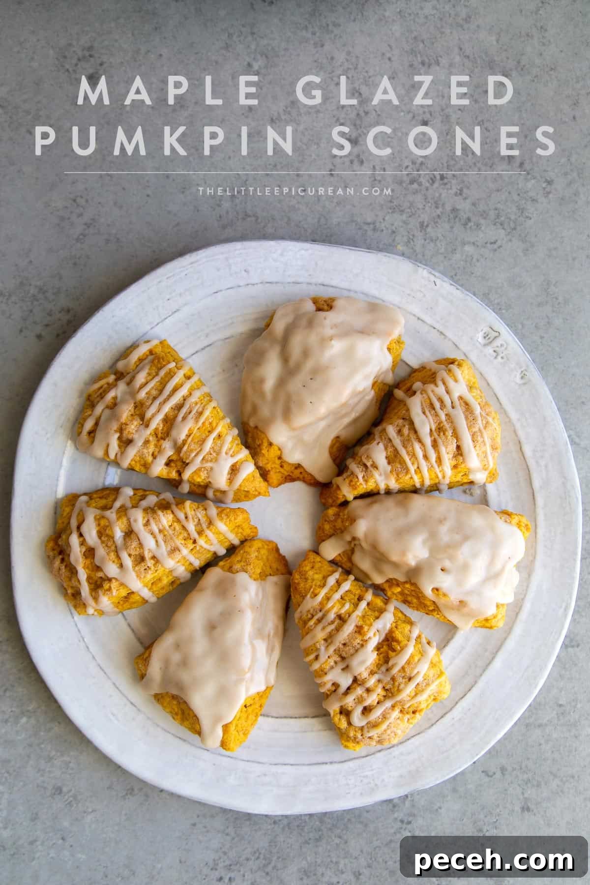 Maple-Glazed Pumpkin Scones Recipe for Fall Baking 3 maple glazed pumpkin scone wedges arranged in a circle on serving plate.