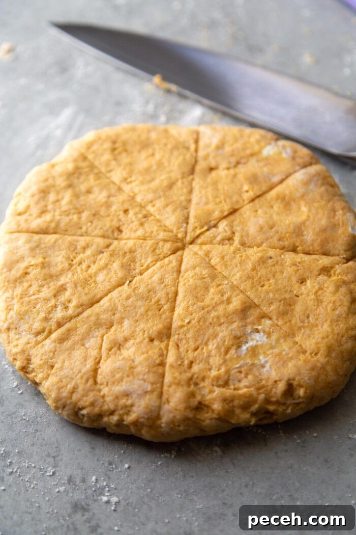 Maple-Glazed Pumpkin Scones Recipe for Fall Baking 8 slice 7-inch pumpkin scone round into 8 equal sized wedges.