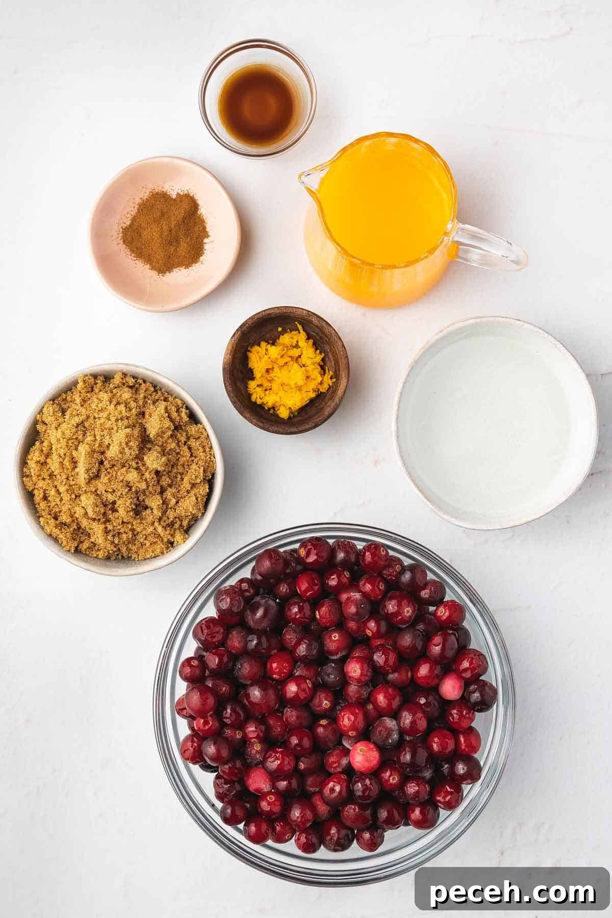 Slow Cooker Cranberry Sauce Recipe for Thanksgiving 3 Ingredients needed to make slow cooker cranberry sauce.