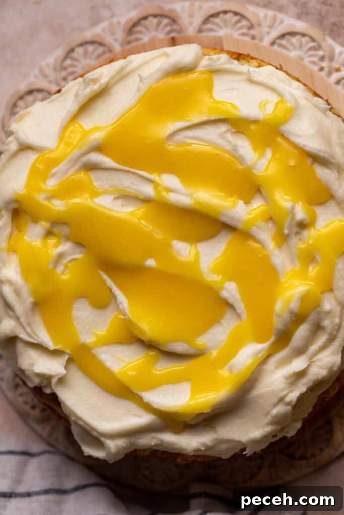 Lemon curd on top of the cake.