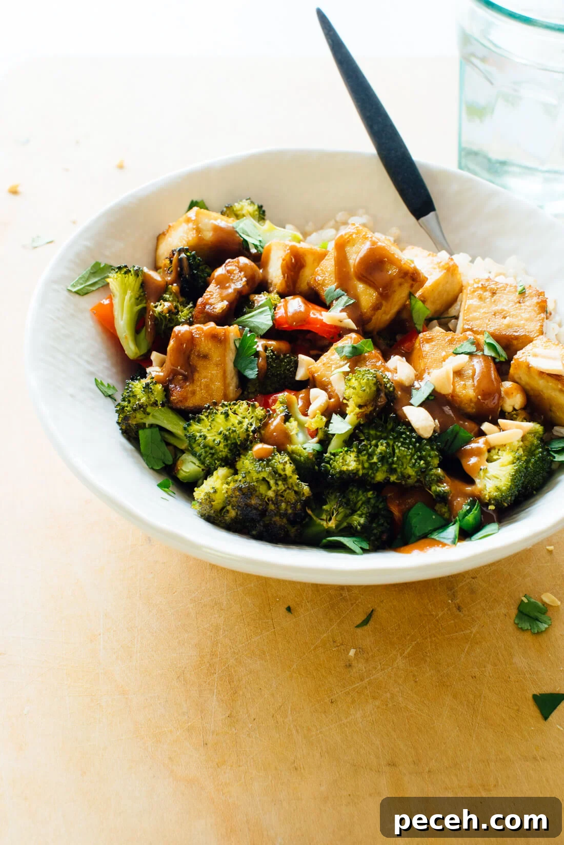 10 Spring Recipes to Try from Love Real Food 10 Roasted Broccoli, Bell Pepper, and Tofu Bowl with Peanut Sauce