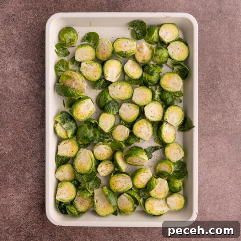 Maple-Balsamic Roasted Brussels Sprouts Recipe for Fall sides 13 Brussels sprouts tossed in olive oil, salt, and pepper